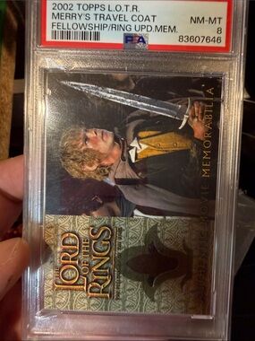 Topps Lord of the Rings Merry Travel Coat Card with Yellow Jacket Accents